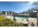 Relaxing community pool with surrounding lounge area at 1213 Van Allen Nw Mews # 47, Atlanta, GA 30318