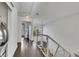 Upper hallway with dark hardwood floors and laundry closet at 1213 Van Allen Nw Mews # 47, Atlanta, GA 30318