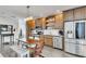Modern kitchen with stainless steel appliances and wooden cabinets at 1213 Van Allen Nw Mews # 47, Atlanta, GA 30318