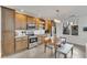 Modern kitchen with stainless steel appliances and wooden cabinets at 1213 Van Allen Nw Mews # 47, Atlanta, GA 30318