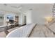 Main bedroom with king bed, home office, and dark hardwood floors at 1213 Van Allen Nw Mews # 47, Atlanta, GA 30318