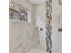 Spa-like shower with marble tile, mosaic accents, and a rainfall shower head at 1213 Van Allen Nw Mews # 47, Atlanta, GA 30318