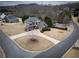 Aerial view of a home with a well-maintained yard at 6310 Talking Tree Ct, Cumming, GA 30028