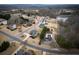 Aerial view of a neighborhood featuring well manicured lawns at 6310 Talking Tree Ct, Cumming, GA 30028