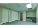 Large basement with storage and work area, featuring neutral paint and recessed lighting at 6310 Talking Tree Ct, Cumming, GA 30028