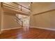 Open foyer featuring a staircase to the second floor and hardwood floors, providing a grand entrance at 6310 Talking Tree Ct, Cumming, GA 30028
