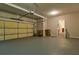 Two-car garage with ample storage space and interior access at 6310 Talking Tree Ct, Cumming, GA 30028