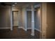 Spacious living room featuring wood floors, neutral paint, ceiling fan, and bright lighting at 6310 Talking Tree Ct, Cumming, GA 30028