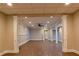 Spacious living room with hardwood floors, neutral paint, recessed lighting, and ceiling fan at 6310 Talking Tree Ct, Cumming, GA 30028