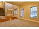 Spacious living room with hardwood floors, neutral walls, and ample natural light at 6310 Talking Tree Ct, Cumming, GA 30028