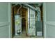 Close up of the utilities including water heater and furnace at 6310 Talking Tree Ct, Cumming, GA 30028