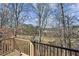 Wooden deck showing the tree-filled backyard and a clear view of the wooded area at 2765 Prado Ln, Marietta, GA 30066