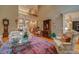An open living room is accented by a second floor overlook and bright views to the front yard at 9070 Huntcliff Trce, Sandy Springs, GA 30350