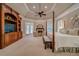 A spacious main bedroom features a sitting area and french doors to a private balcony at 9070 Huntcliff Trce, Sandy Springs, GA 30350