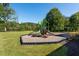 Community playground with swings, slides, and a picnic area, perfect for Gathering fun at 9070 Huntcliff Trce, Sandy Springs, GA 30350