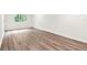 Spacious basement area with wood-look flooring and natural light at 1428 Muirfield Dr, Stone Mountain, GA 30088