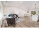 Bright and airy living room with hardwood floors, modern decor, and plenty of natural light at 1428 Muirfield Dr, Stone Mountain, GA 30088