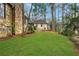 Expansive backyard featuring manicured lawn and picturesque views of the surrounding landscape at 6 Arden Moor Nw, Atlanta, GA 30305