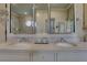Elegant bathroom featuring a double vanity with marble countertop and stylish fixtures at 6 Arden Moor Nw, Atlanta, GA 30305
