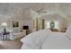 Neutral bedroom featuring a ceiling fan, seating area and natural light at 6 Arden Moor Nw, Atlanta, GA 30305