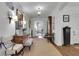 Inviting entryway with hardwood floors, antique clock, and classic decor at 6 Arden Moor Nw, Atlanta, GA 30305