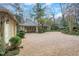 Charming home with landscaped front yard, detached garage and covered portico at 6 Arden Moor Nw, Atlanta, GA 30305