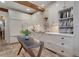 Bright kitchen featuring white cabinets, stone countertops, and stainless-steel appliances at 6 Arden Moor Nw, Atlanta, GA 30305