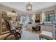 Comfortable home office with custom cabinets, multiple windows and sophisticated decor at 6 Arden Moor Nw, Atlanta, GA 30305
