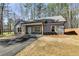 Single story gray house with stone accents and a covered porch at 835 Old Brock Rd, Rockmart, GA 30153