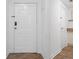Apartment entry with white door, tile floor, and coat closet at 1501 Clairmont Rd # 223, Decatur, GA 30033