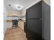 Galley kitchen with stainless steel appliances and light cabinets at 1501 Clairmont Rd # 223, Decatur, GA 30033
