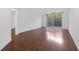 Living room with hardwood floors and sliding glass door to patio at 1501 Clairmont Rd # 223, Decatur, GA 30033