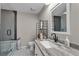 Updated bathroom with granite vanity, tiled shower, and modern fixtures at 418 Kenley Ct, Mcdonough, GA 30253