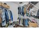 Large walk-in closet with ample shelving and hanging space at 418 Kenley Ct, Mcdonough, GA 30253