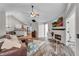 Spacious living room with fireplace and hardwood floors at 418 Kenley Ct, Mcdonough, GA 30253