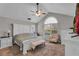 Spacious main bedroom with large windows, plush carpeting, and ample closet space at 418 Kenley Ct, Mcdonough, GA 30253