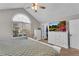 Main bedroom with large window, dresser, and closet at 418 Kenley Ct, Mcdonough, GA 30253