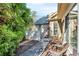 Charming side yard with walkway and seating area at 418 Kenley Ct, Mcdonough, GA 30253