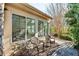 Sunroom with wicker chairs and view of backyard at 418 Kenley Ct, Mcdonough, GA 30253