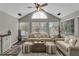 Relaxing sunroom with ample natural light and seating at 418 Kenley Ct, Mcdonough, GA 30253