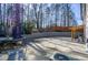 Spacious backyard patio with trampoline and AC unit at 1496 Sweet Bottom Sw Cir, Marietta, GA 30064