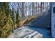 Steps leading up from a paved patio to a fenced backyard at 1496 Sweet Bottom Sw Cir, Marietta, GA 30064
