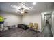 Spacious finished basement with multiple seating areas at 1496 Sweet Bottom Sw Cir, Marietta, GA 30064