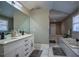 Elegant bathroom with double vanity, soaking tub, and large walk-in shower at 1496 Sweet Bottom Sw Cir, Marietta, GA 30064