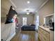 Bedroom with hardwood floors, mounted TV, and large windows at 1496 Sweet Bottom Sw Cir, Marietta, GA 30064