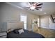 Bedroom with hardwood floors and a ceiling fan at 1496 Sweet Bottom Sw Cir, Marietta, GA 30064