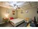 Basement bedroom with comfortable bed and ceiling fan at 1496 Sweet Bottom Sw Cir, Marietta, GA 30064