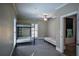 Bedroom with bunk beds, carpet flooring, and large windows at 1496 Sweet Bottom Sw Cir, Marietta, GA 30064