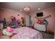 bedroom with pink decor and ample storage space at 1496 Sweet Bottom Sw Cir, Marietta, GA 30064