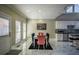 Bright dining area with marble floors and a modern table at 1496 Sweet Bottom Sw Cir, Marietta, GA 30064